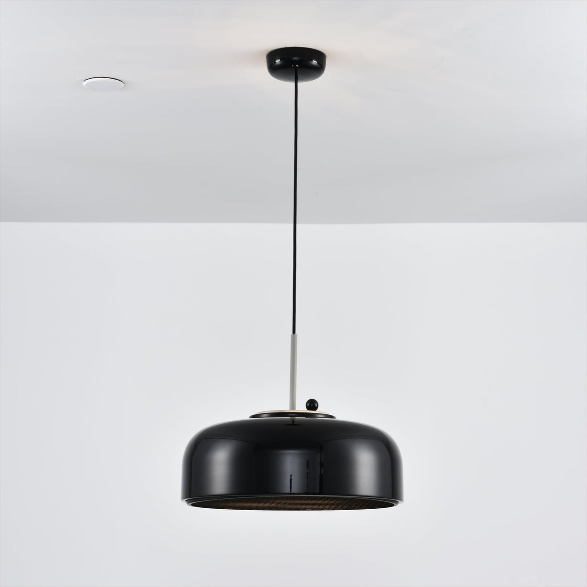 Misha Pendant Light in grey, hanging in a series.