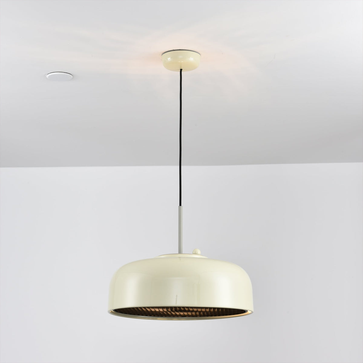 Misha Pendant Light in white in a minimalist setting.