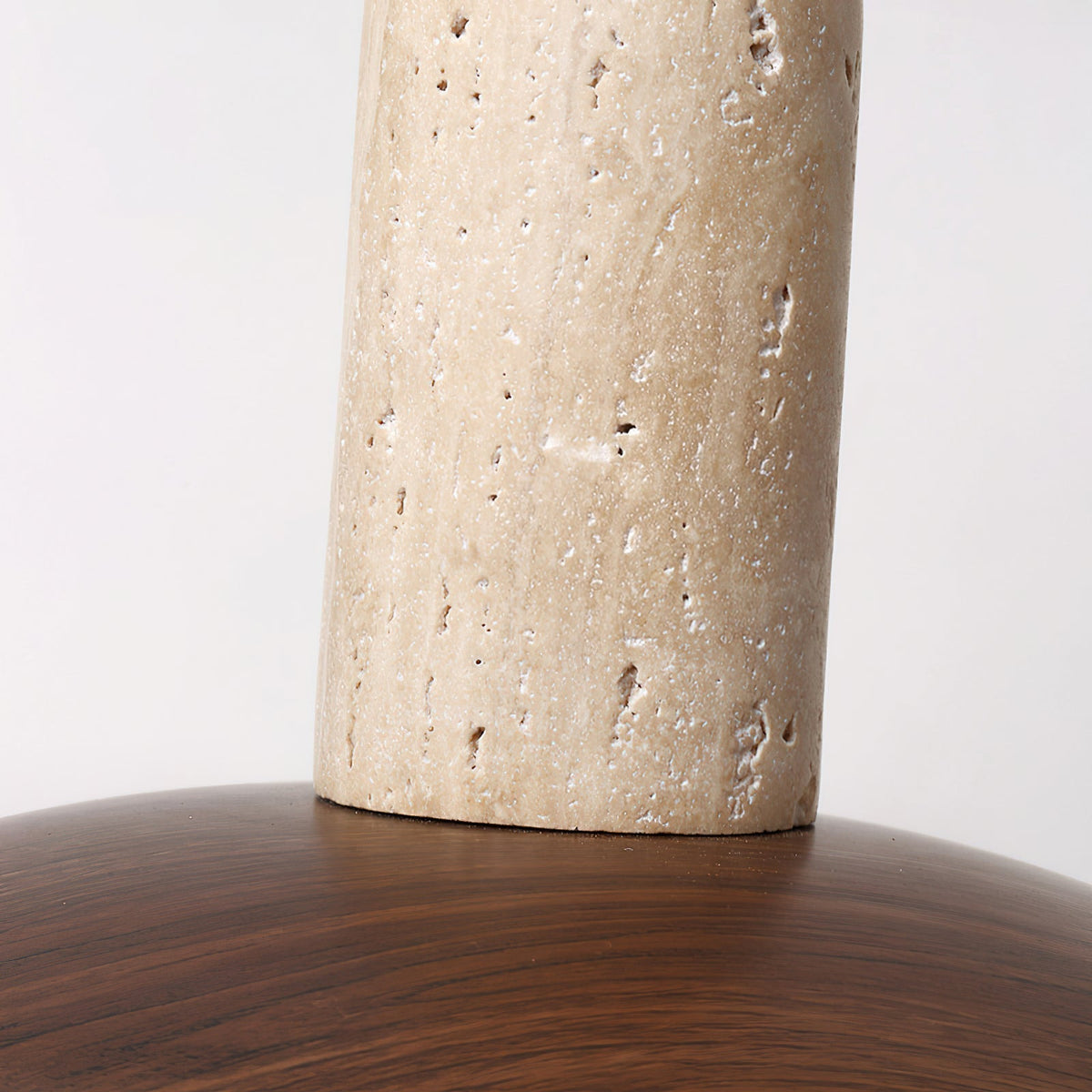 Top-down view showcasing the elegant travertine cap of the pendant.