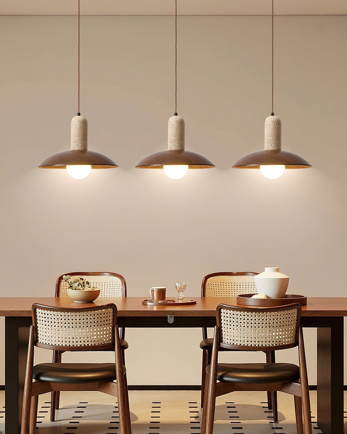 The 2-light Molly Pendant Lamp suspended over a rectangular dining table.