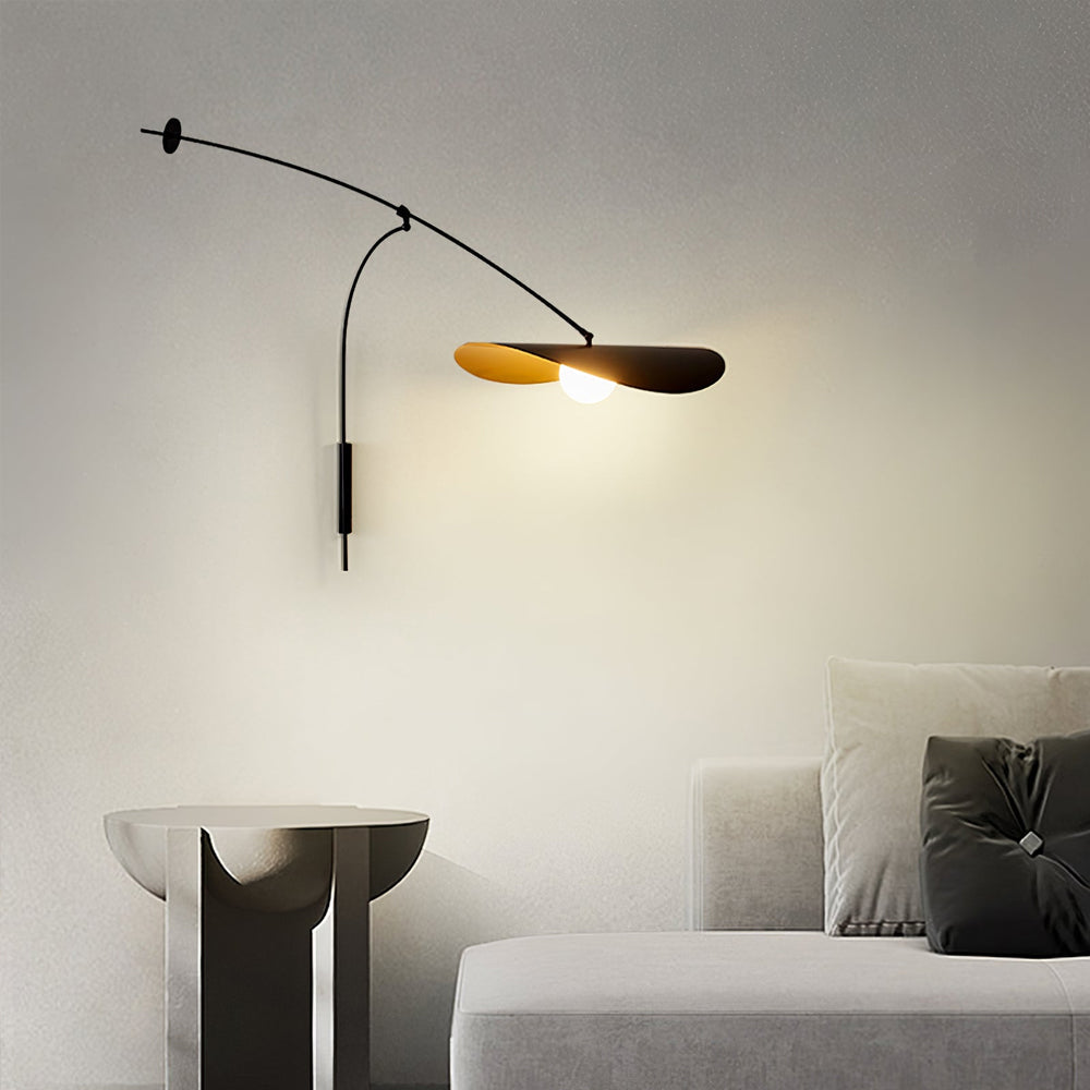 The mid-century inspired design of the Myrna Wall Lamp.