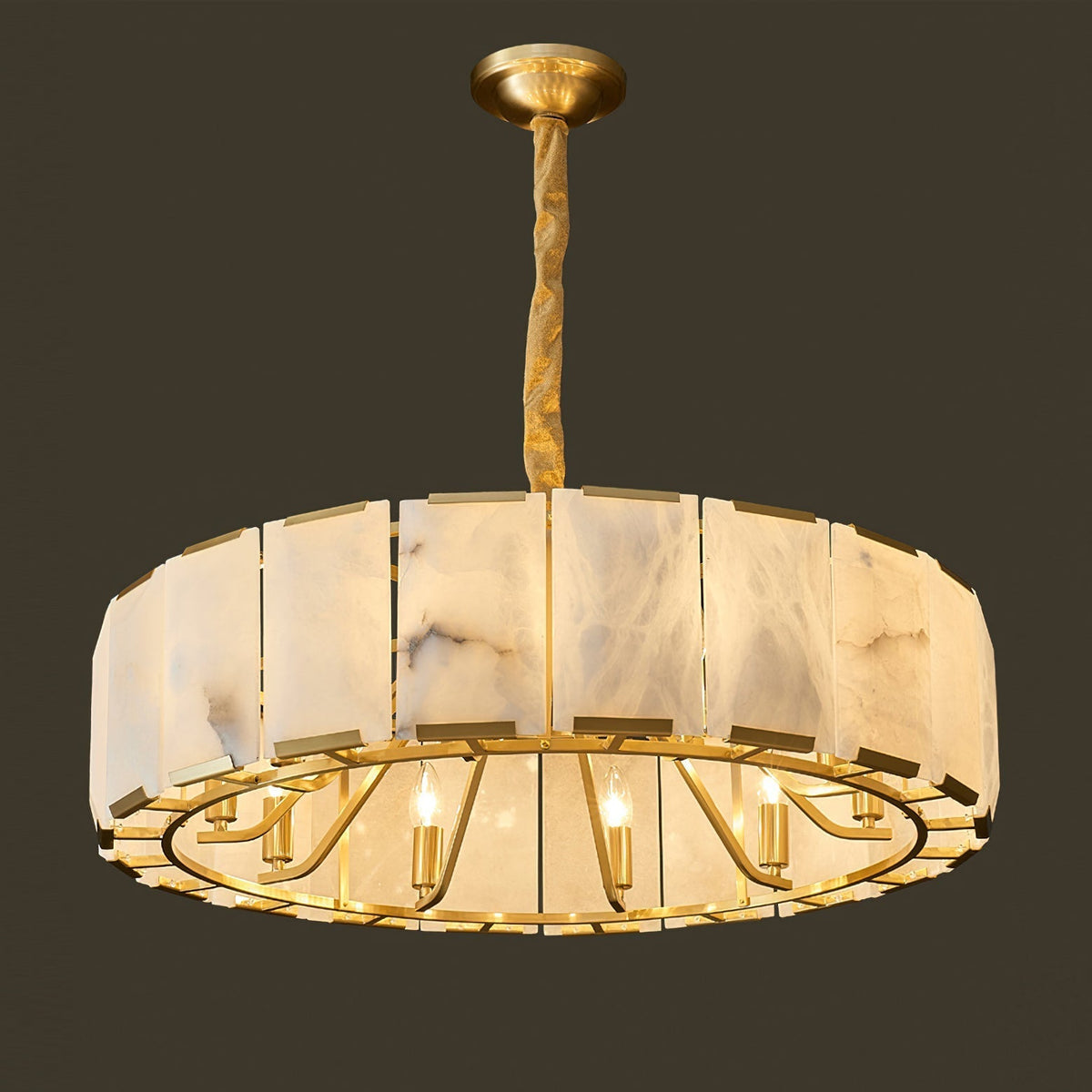 The Nashima Chandelier hanging over a contemporary dining table.