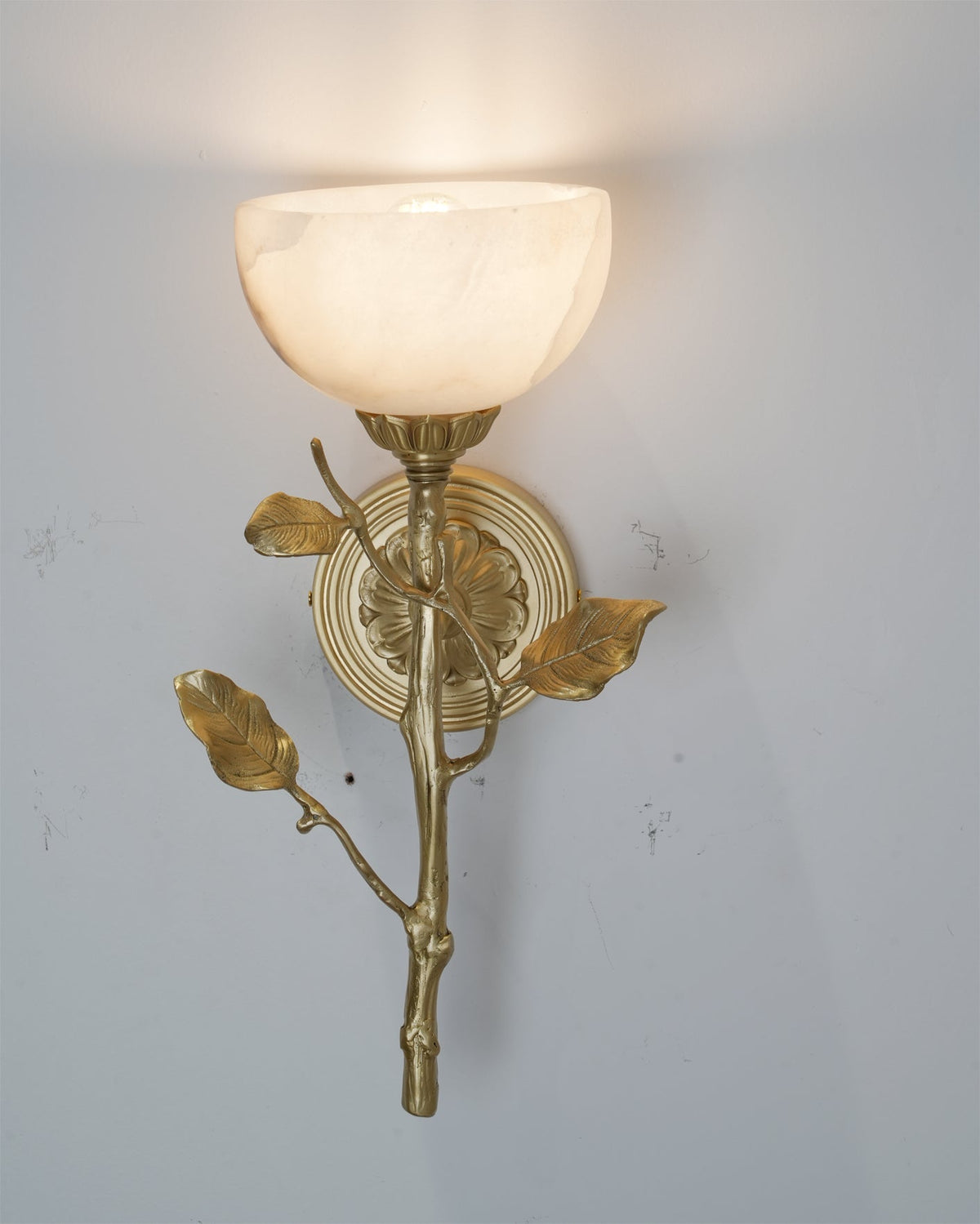 View from underneath the sconce, showing the bulb placement within the shade.