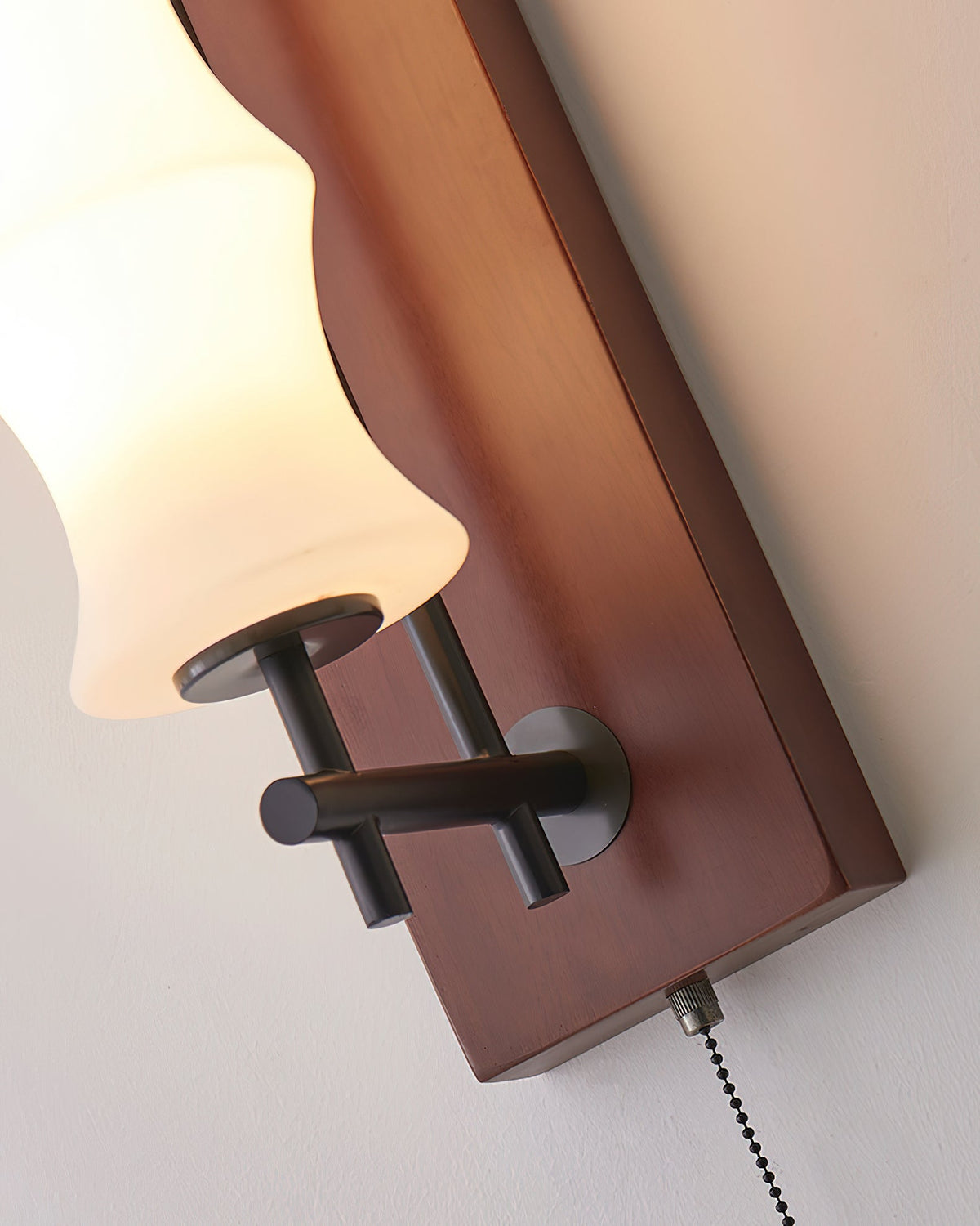 Close-up on the texture of the wavy glass cone shade.