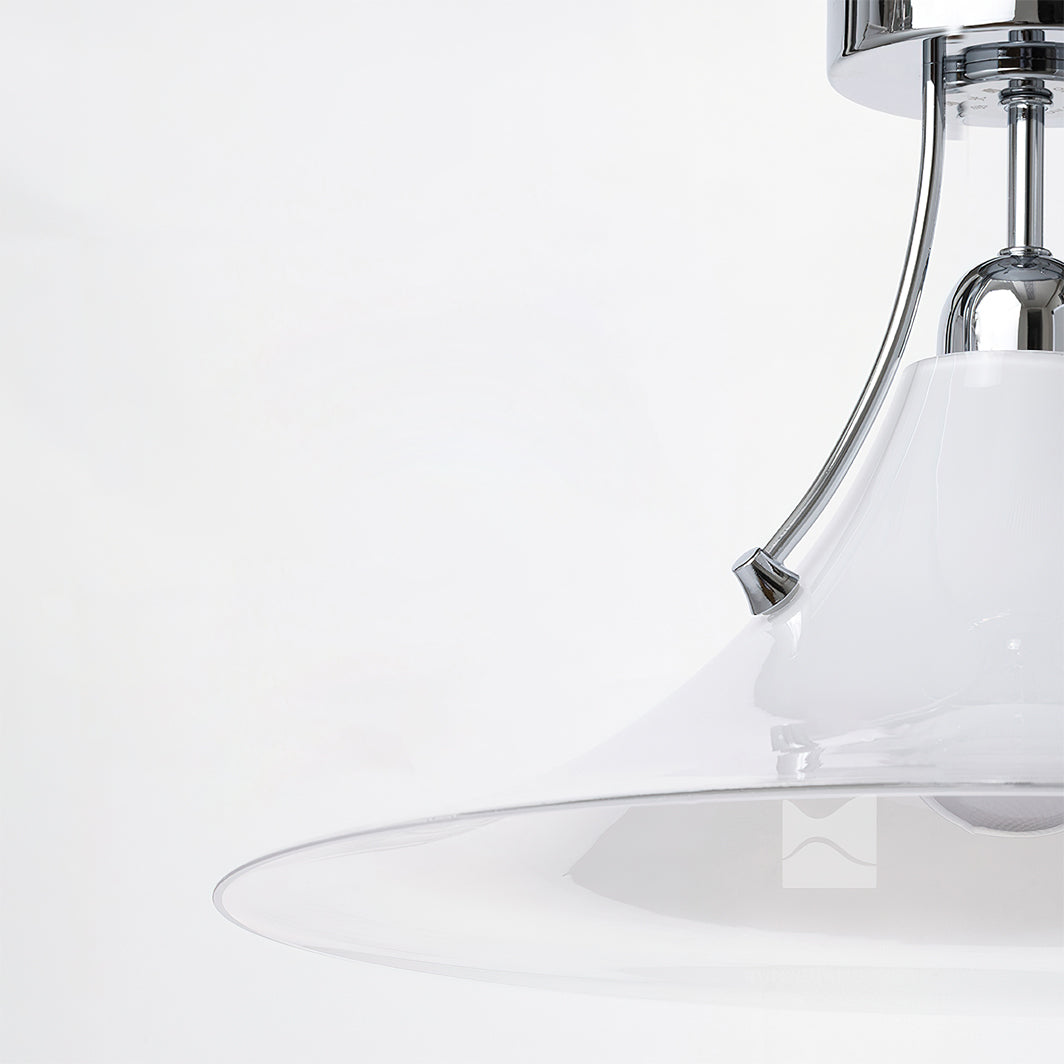 Detailed shot of the metal and glass construction of the ceiling lamp.
