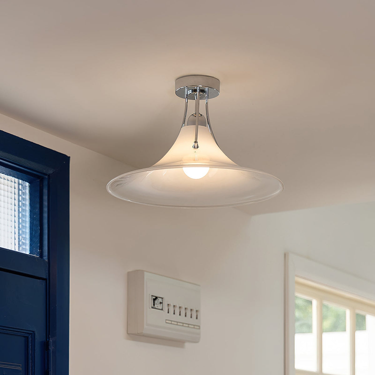 Close-up of the Orient Ceiling Lamp's chrome and white details.