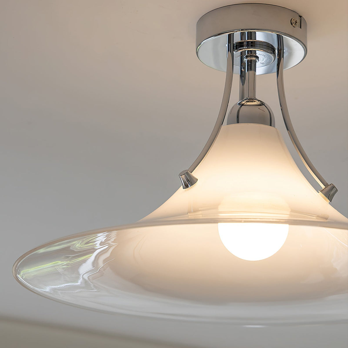 Lifestyle image of the Orient Ceiling Lamp in a contemporary living room.