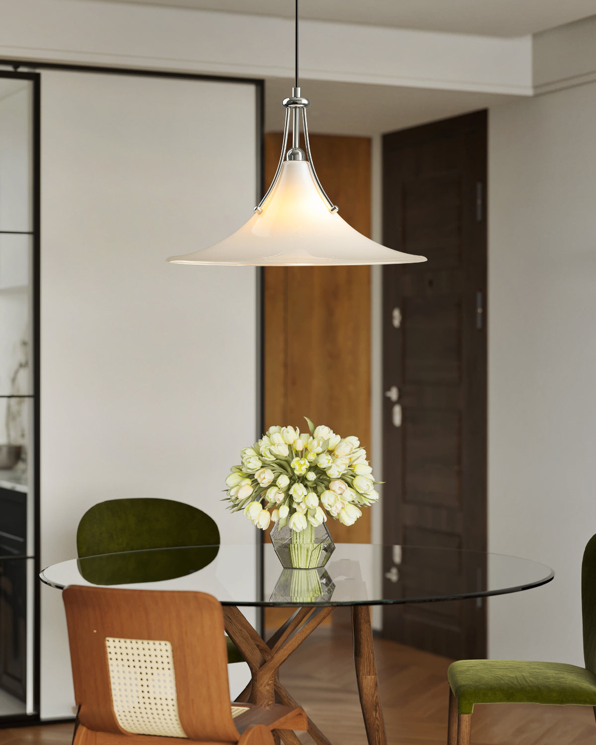 Lifestyle image of the Orient Swing Arm Pendant Light in a reading nook.