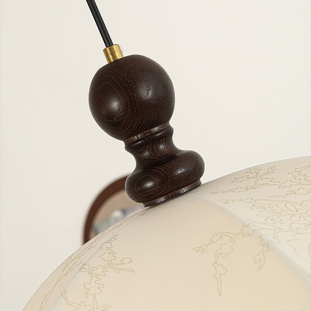 Oriente Pendant Light shown from below, highlighting the E14 bulb base.
