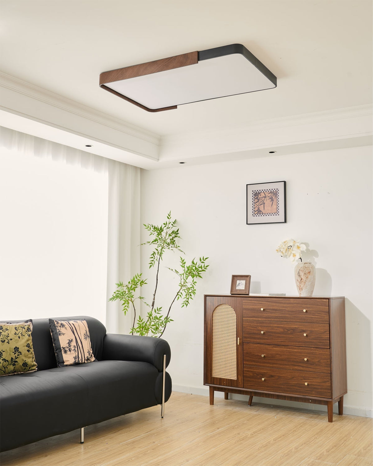 Orren Ceiling Light with warm light turned on in a cozy setting.
