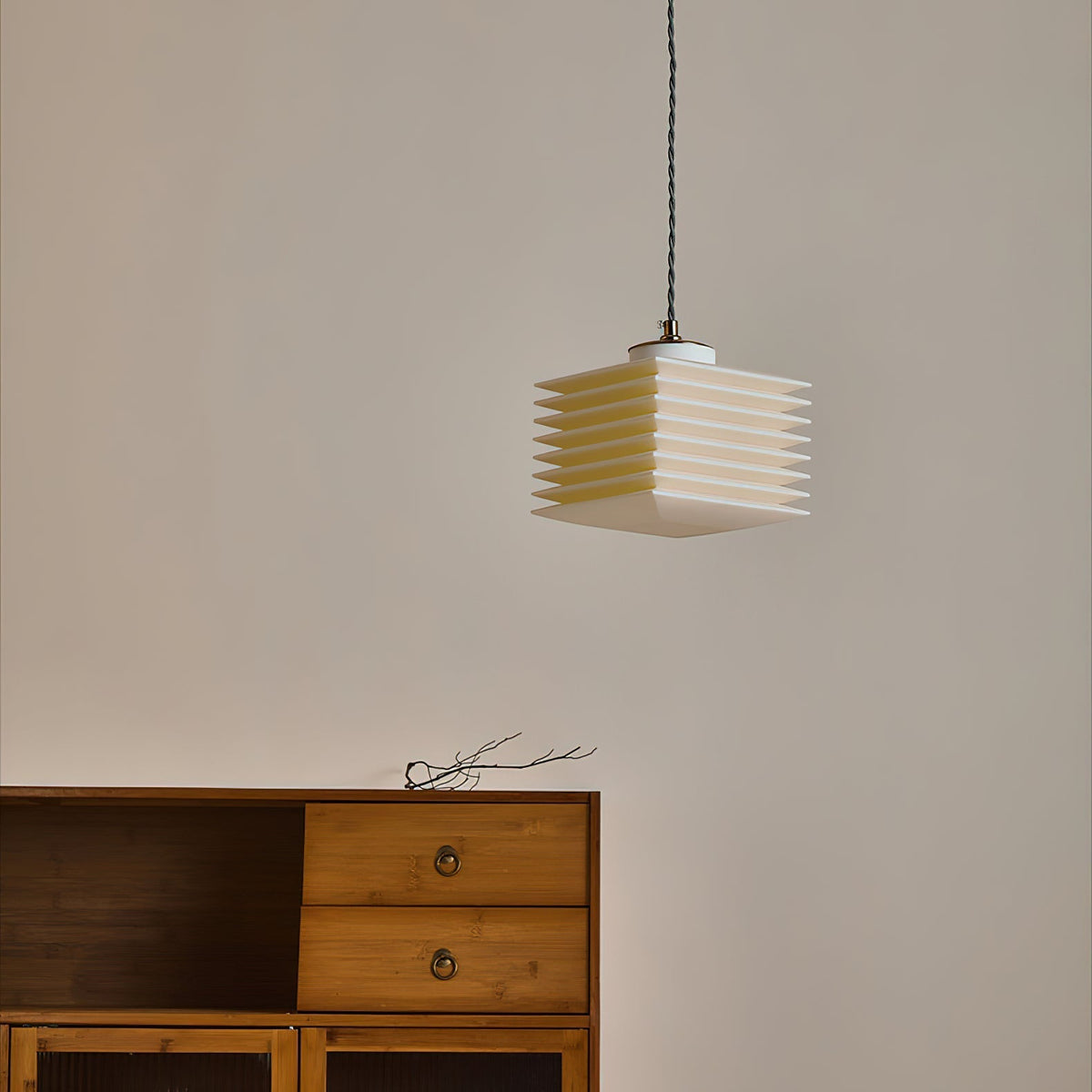 Close-up of the layered design of the white Pagoda Pendant Lamp.