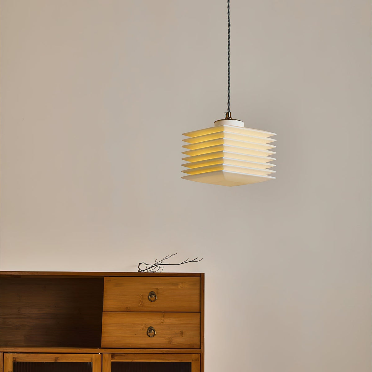 The smaller size Pagoda Pendant Lamp (16cm) hanging in a room.