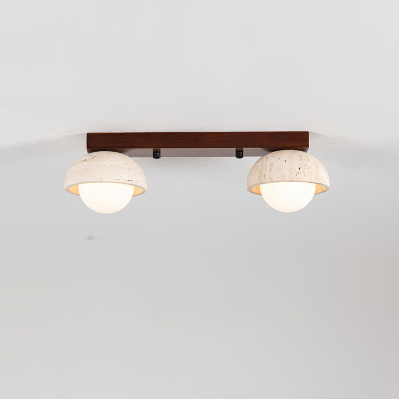 Close-up of the G9 bulb fixture within the travertine dome.