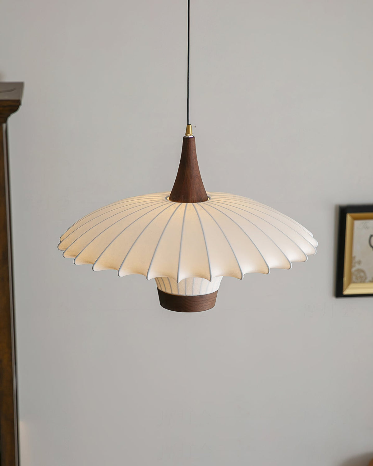 Close-up of the pleated fabric texture on the Parasol Pendant Light.