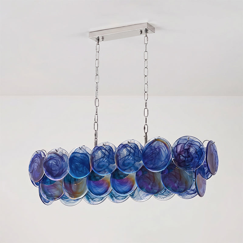 The 90cm Pavone Chandelier illuminating a contemporary kitchen island.