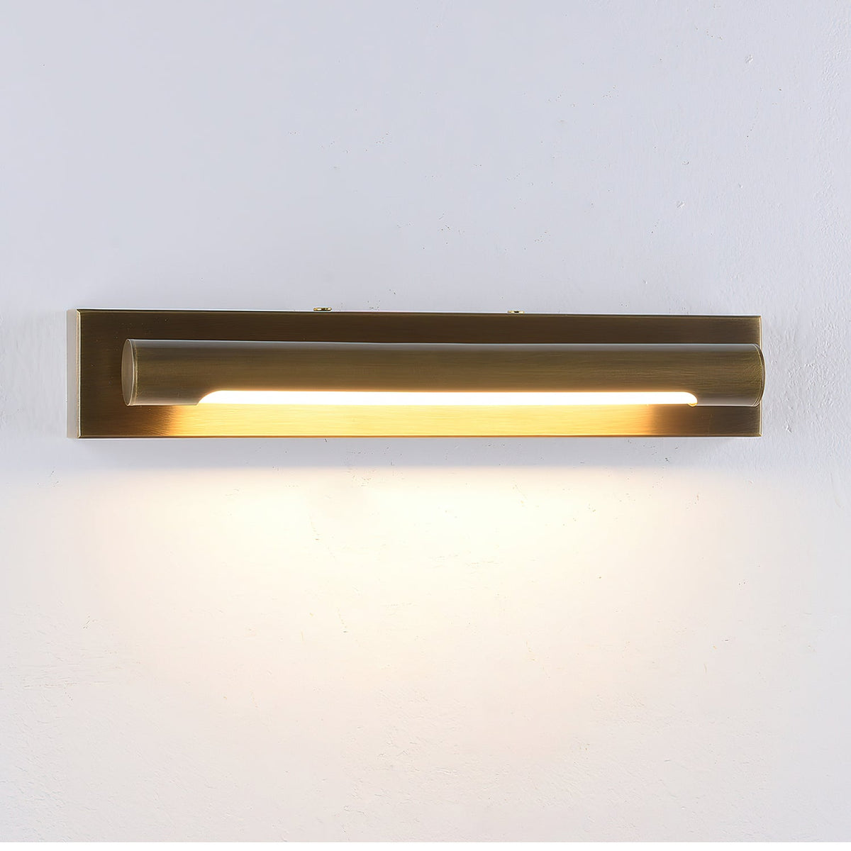 Penrith Linear Wall Sconce shown mounted on a wall, casting a downward glow.
