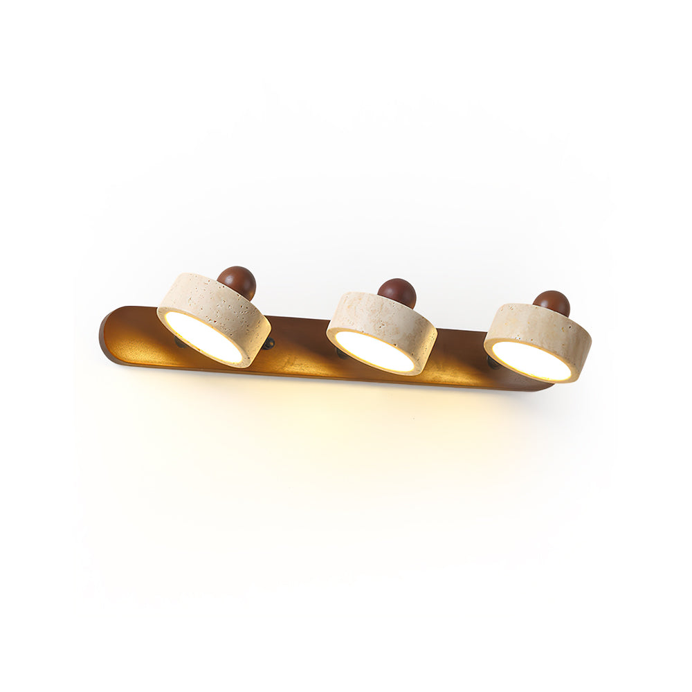 Comparison shot showing the 2-head, 3-head, and 4-head sizes of the Piero Travertine Wall Lamp.