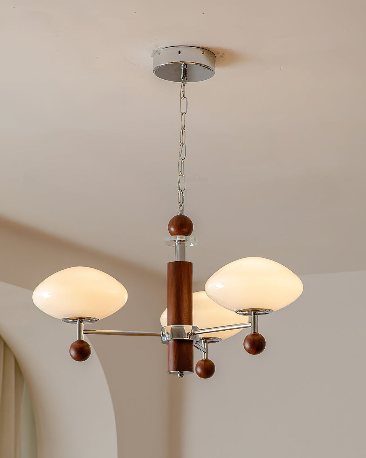 Side profile of the Pointed Chandelier, highlighting its sleek structure.