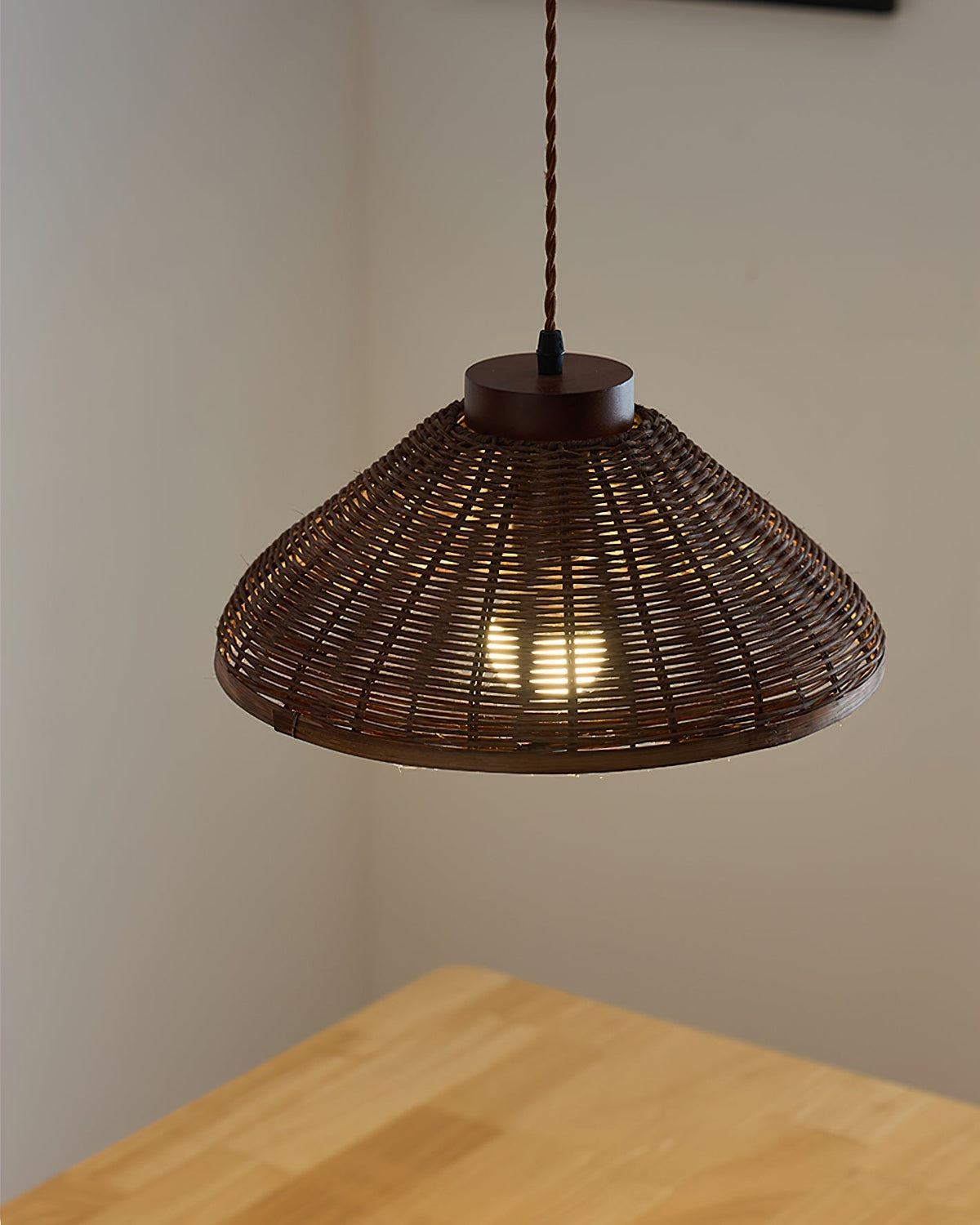Detailed shot of the wood and rattan materials of the Rasa Pendant Light.