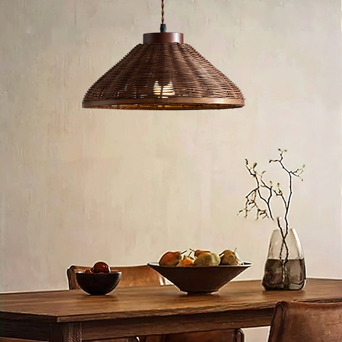 Close-up view of the natural rattan weave on the Rasa Pendant Light.