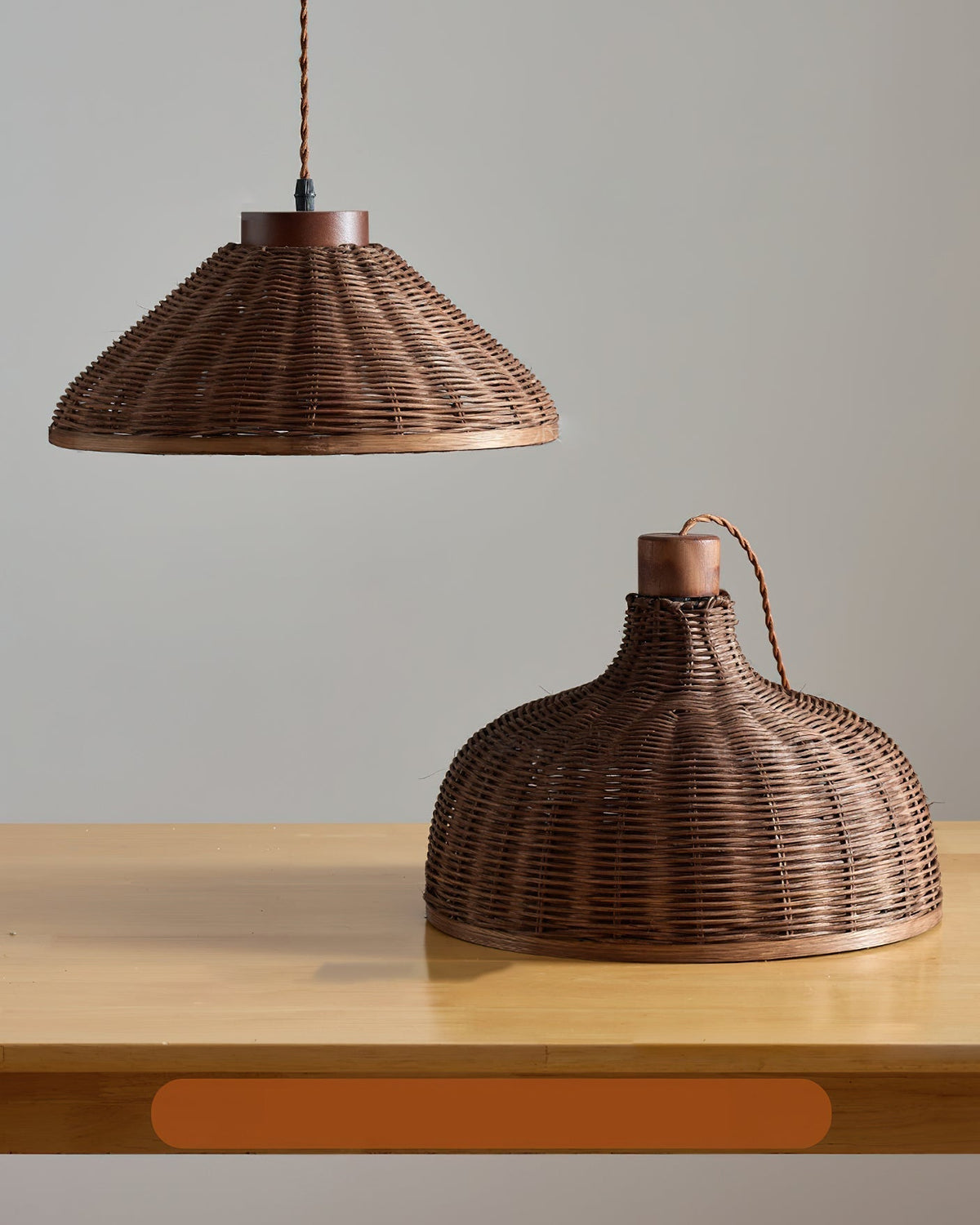 A pair of Rasa Pendant Lights installed over a modern kitchen island.