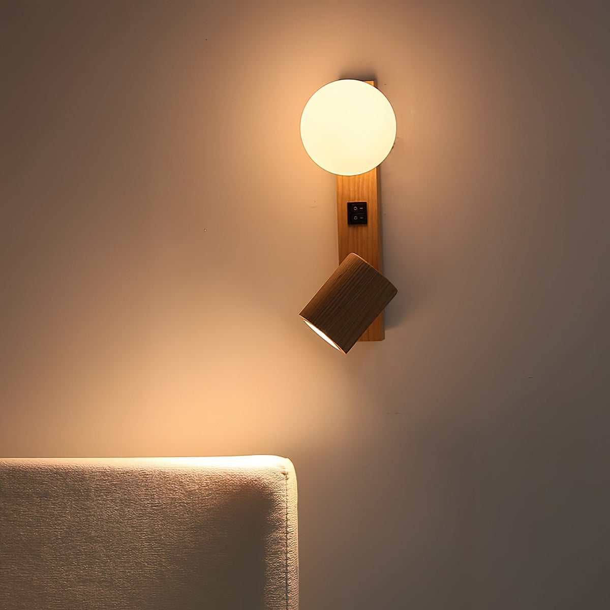Rensen Wall Lamp in a bedroom setting, providing ambient light.