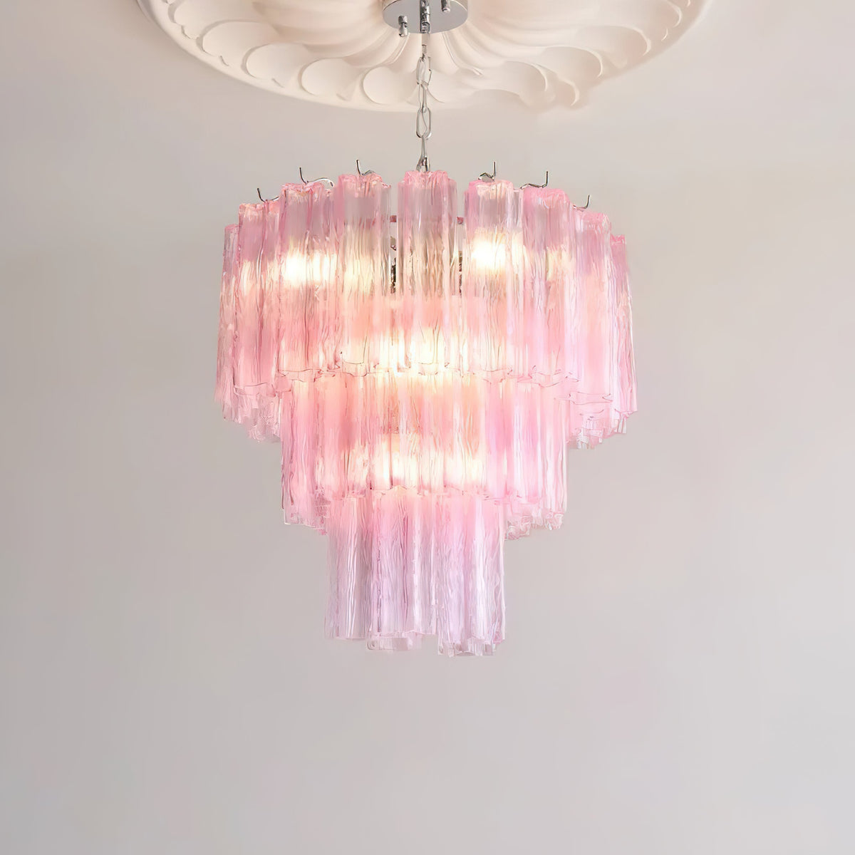 The 2-layer Rhodes Chandelier providing ambient light over a dining table.