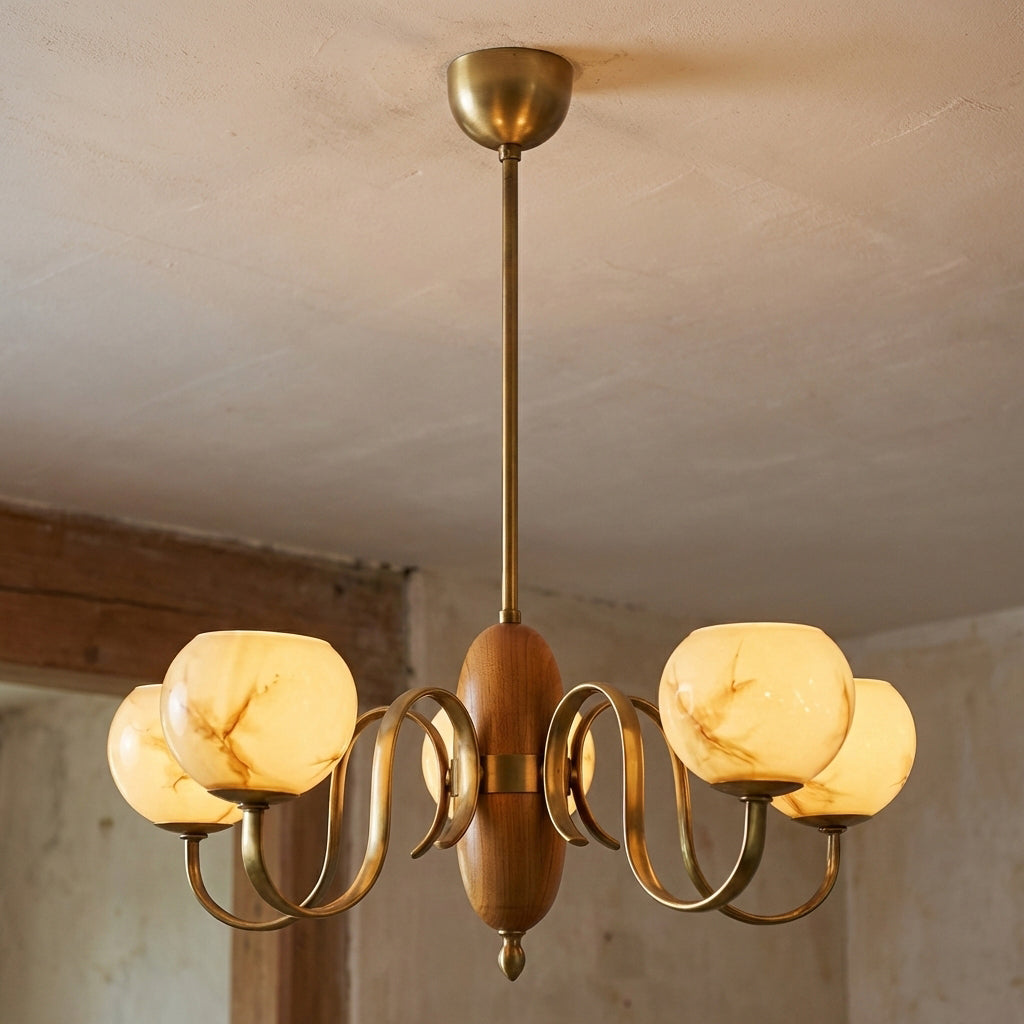 Close-up of the hand-blown beige glass shade on the Linnea Chandelier.