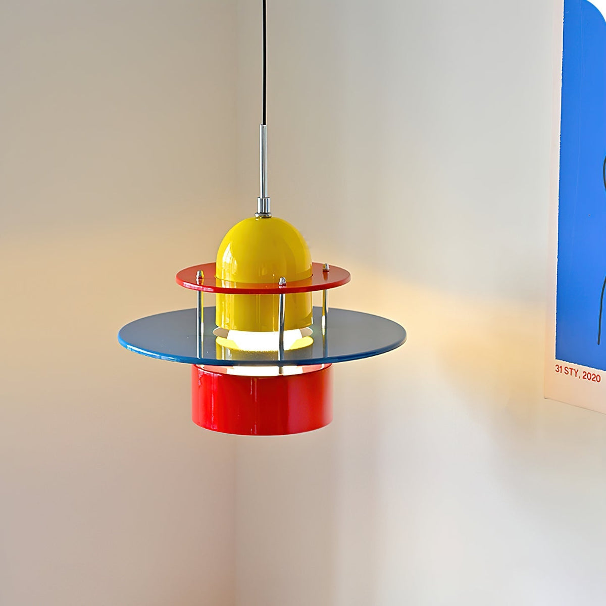 Lifestyle image of the pendant light hanging over a contemporary table.