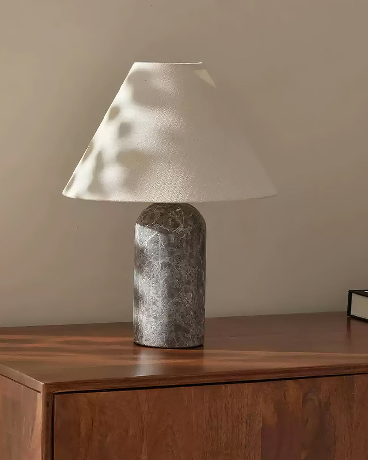 The Sacha Marble Table Lamp displayed in a green marble finish.