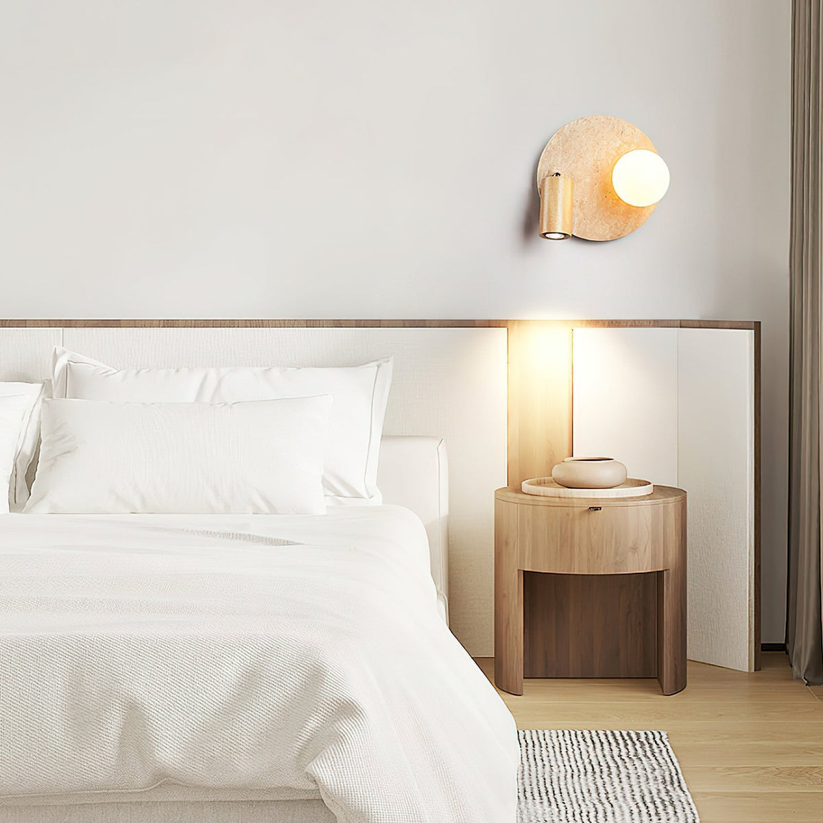 Model B of the Luka Wall Lamp with its rectangular travertine base.
