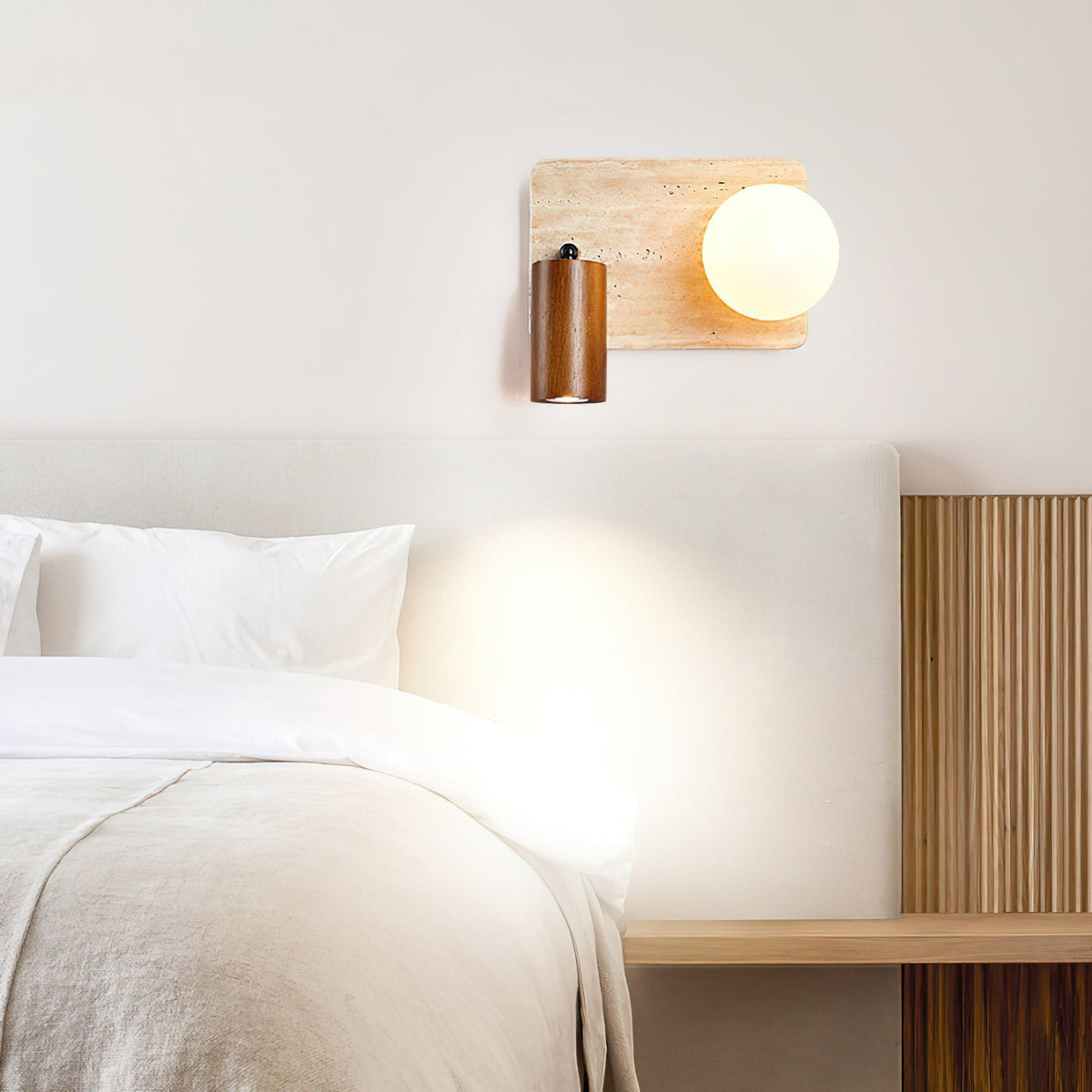 Model A of the Luka Wall Lamp with its circular travertine design.