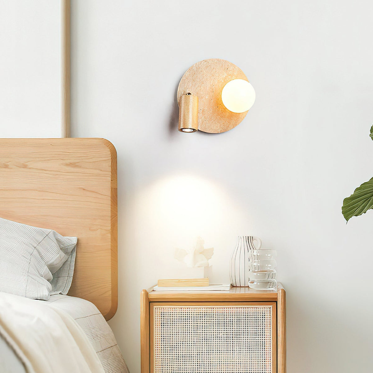 Detail of the frosted glass shade and wood accent on the Luka Wall Lamp.