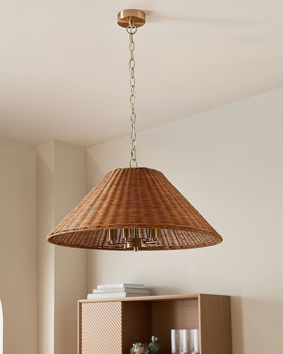 Saskia Pendant Light illuminating a living space with a warm glow.