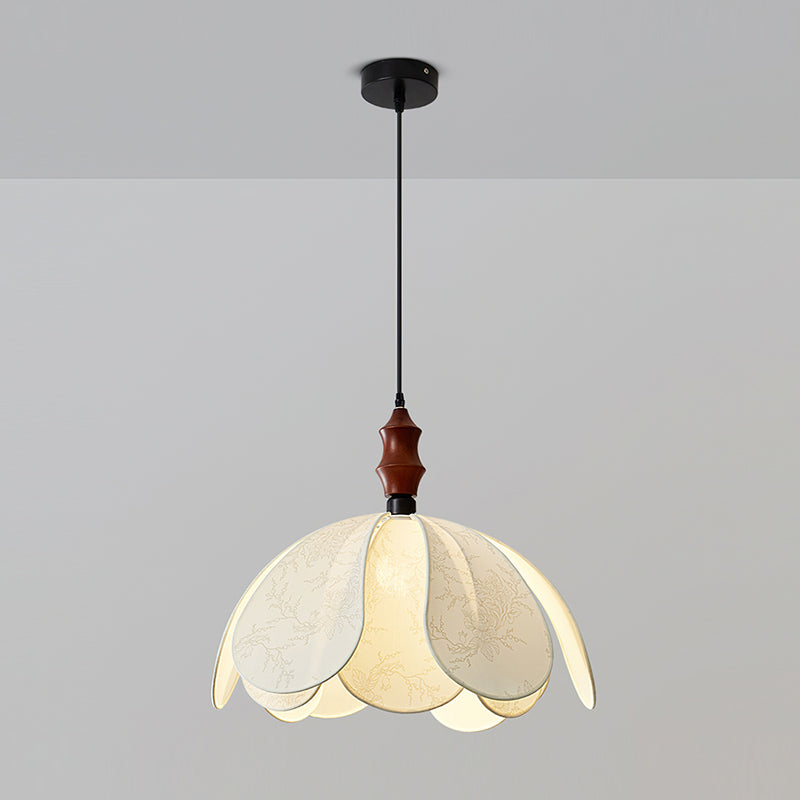 The Savoy Pendant Light used as a statement piece in a minimalist bedroom.