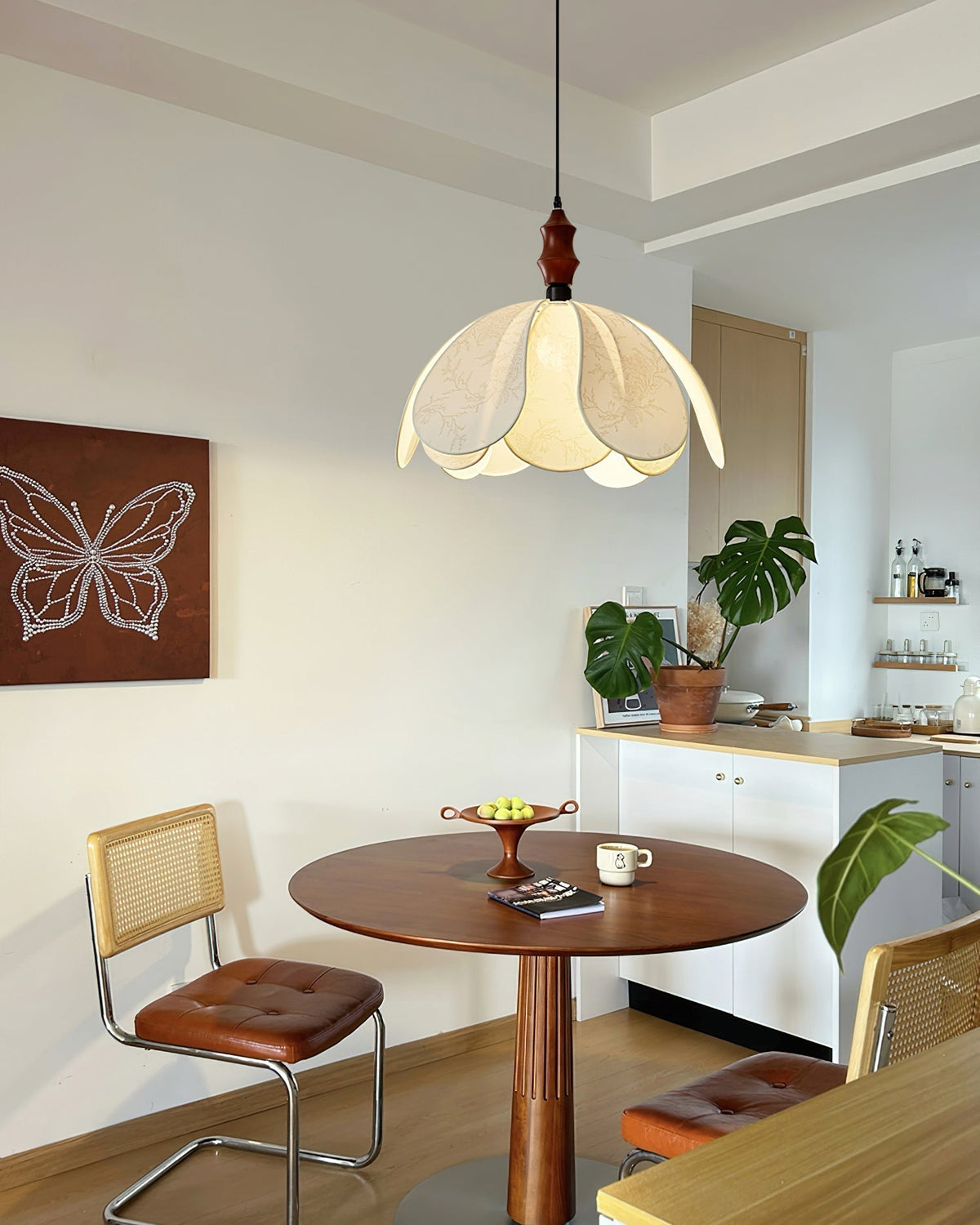 Savoy Pendant Light hanging in a modern living room setting.