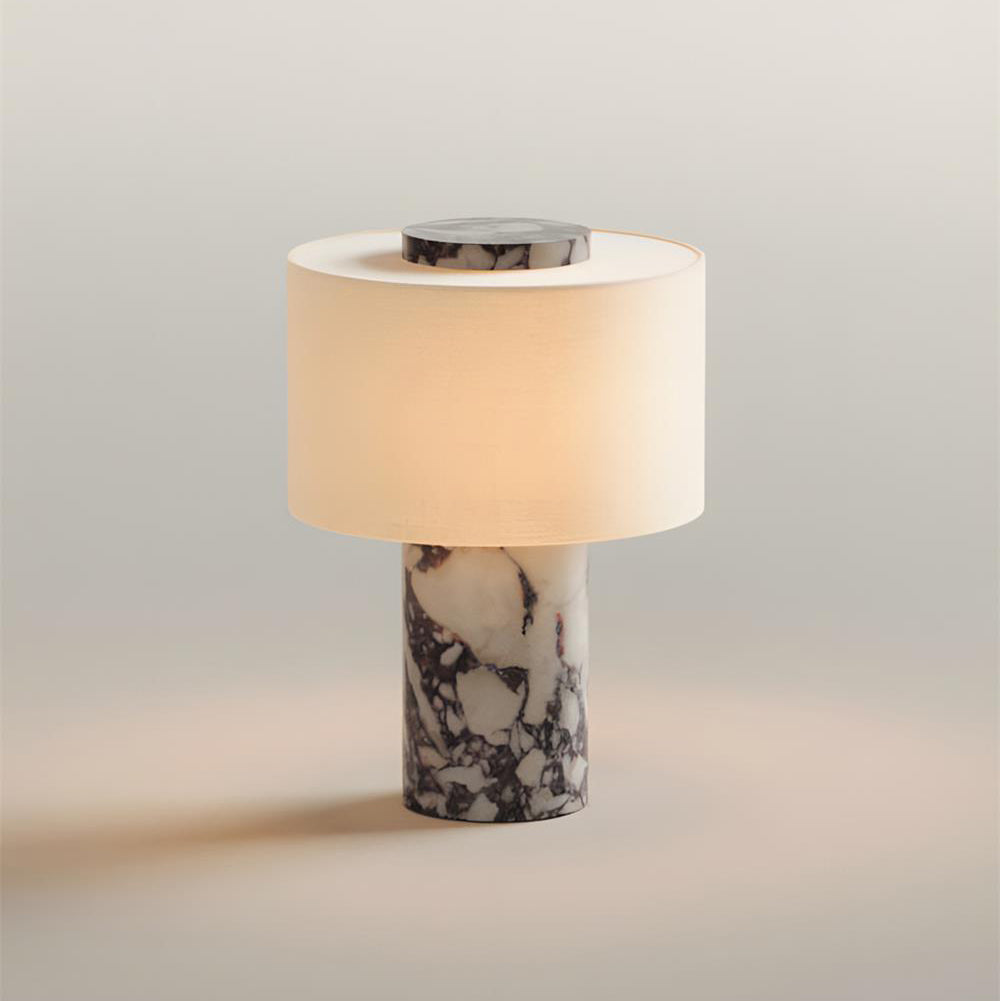 Different angle of the lamp in a styled bedroom setting.