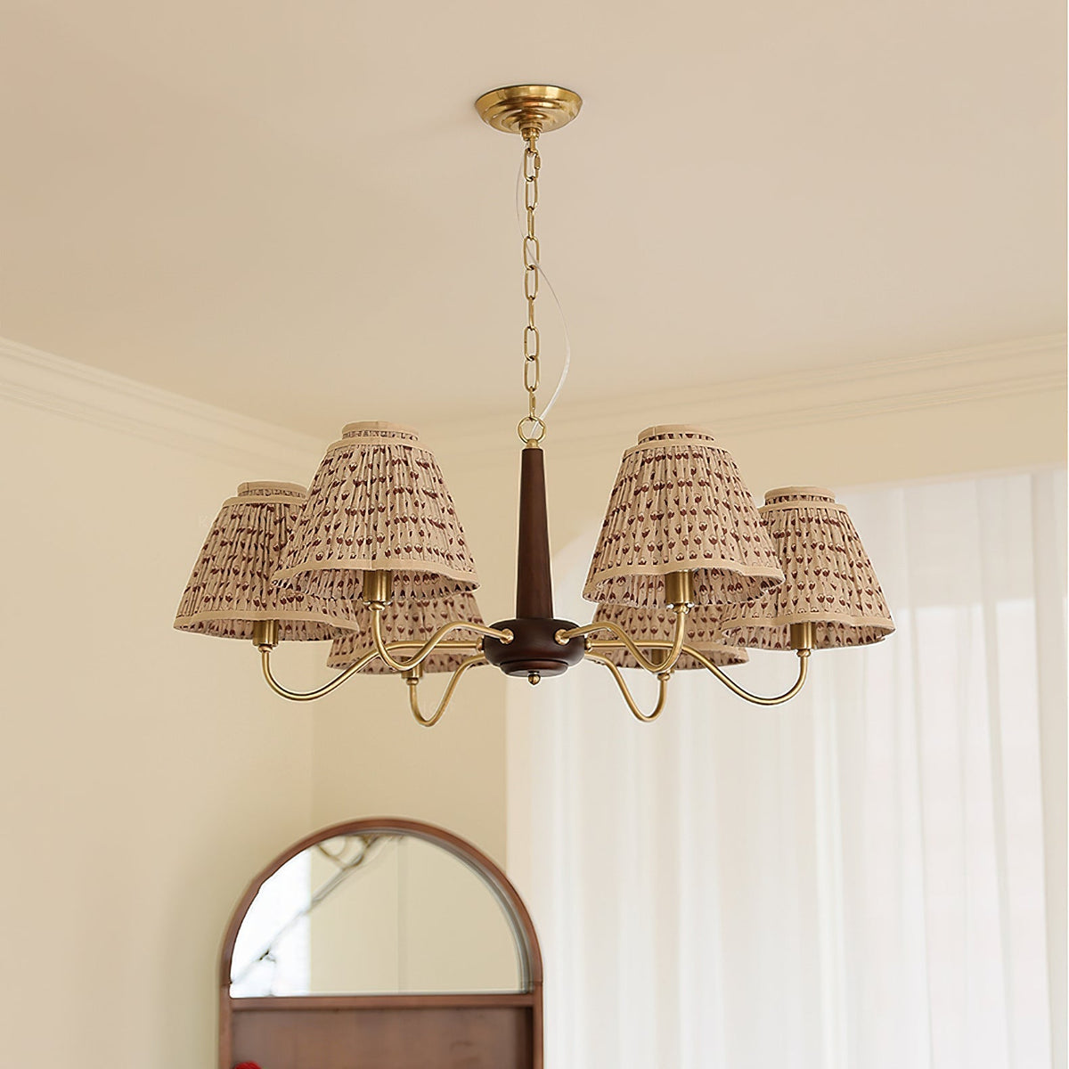 Close-up of the Selva Chandelier's smocked fabric and metal frame.