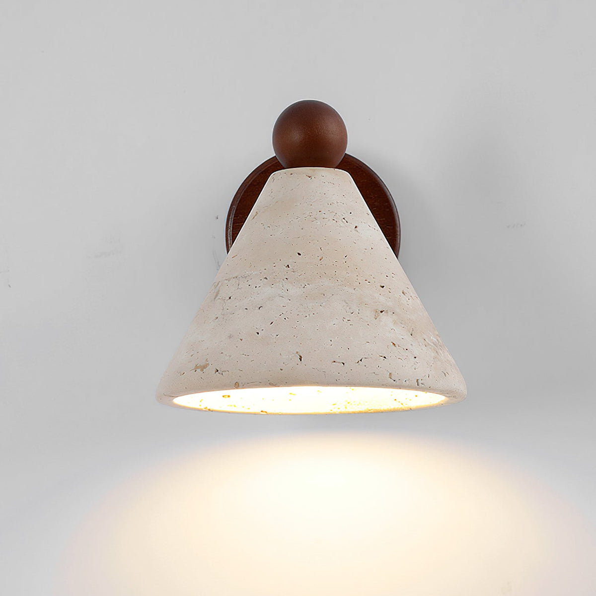 The wall light shown in context, adding a sculptural element to the wall.