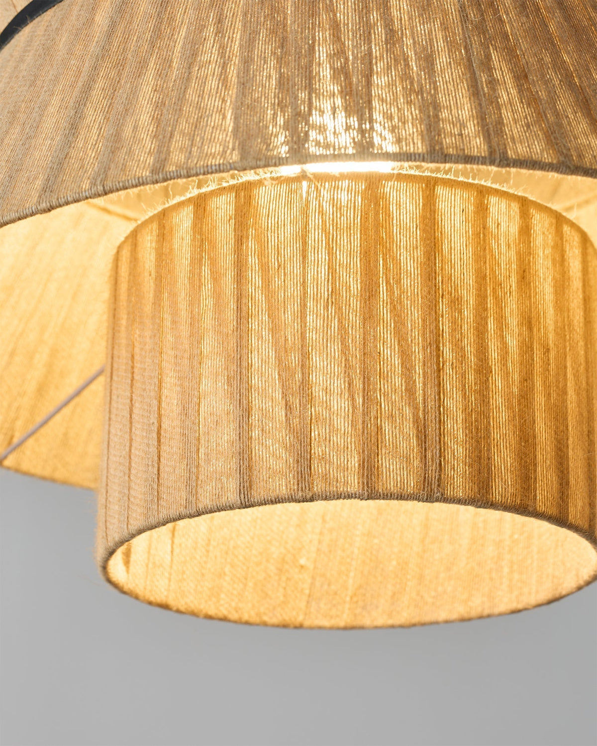Lifestyle image of the Sicel Pendant Light in a minimalist interior.
