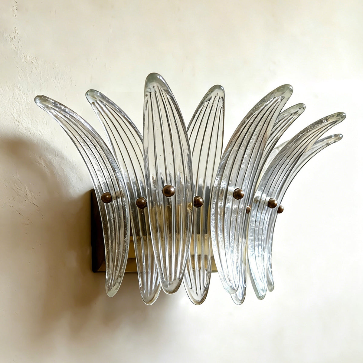 Low-angle shot of the Pink Smeralda Wall Sconce.
