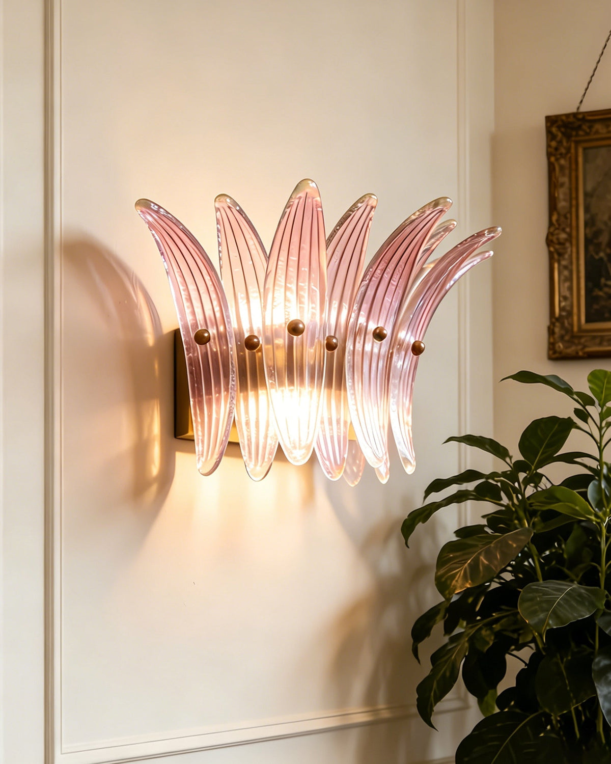 Smeralda Wall Sconce mounted above a fireplace mantel.
