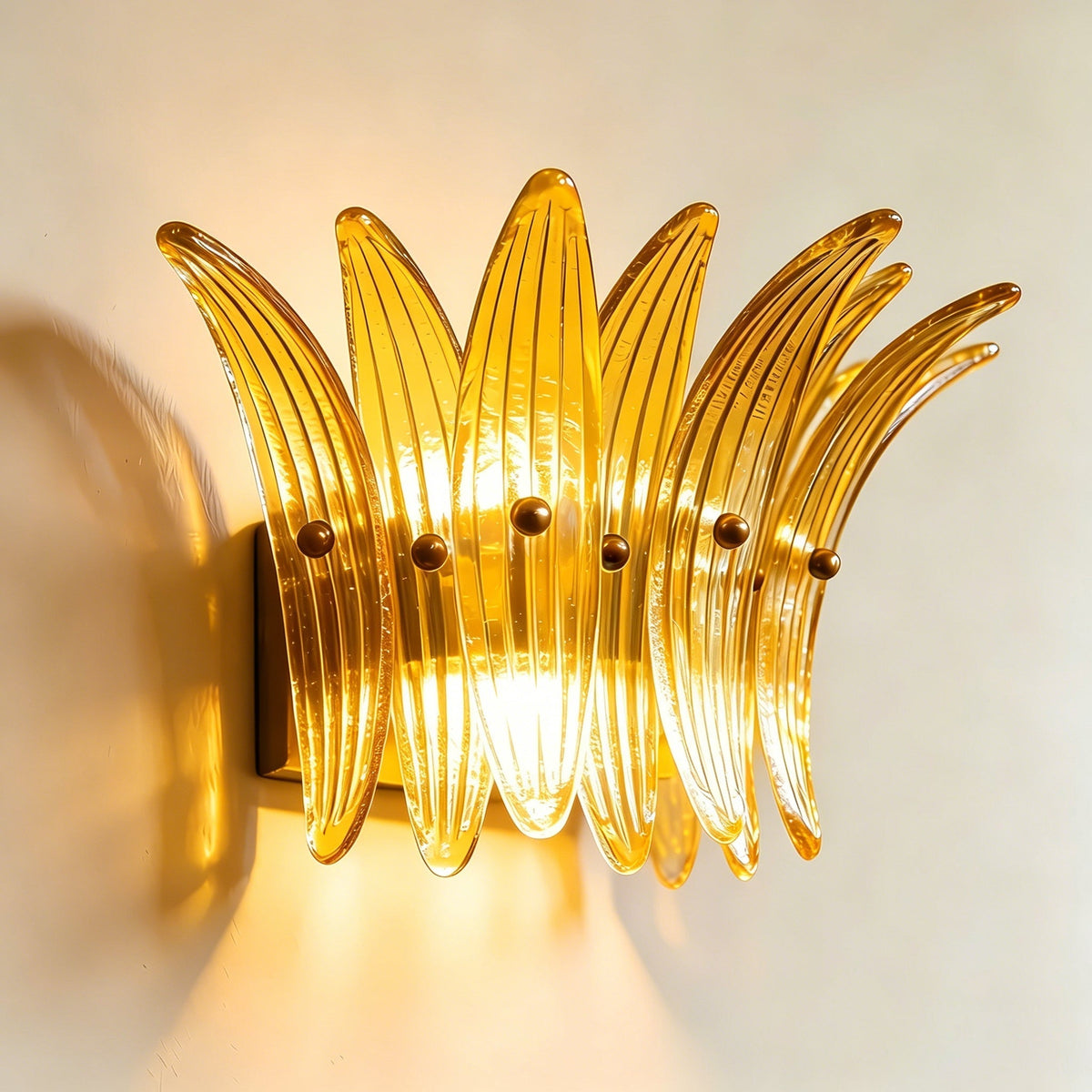 Close-up detail of the Amber ribbed glass on the Smeralda Wall Sconce.