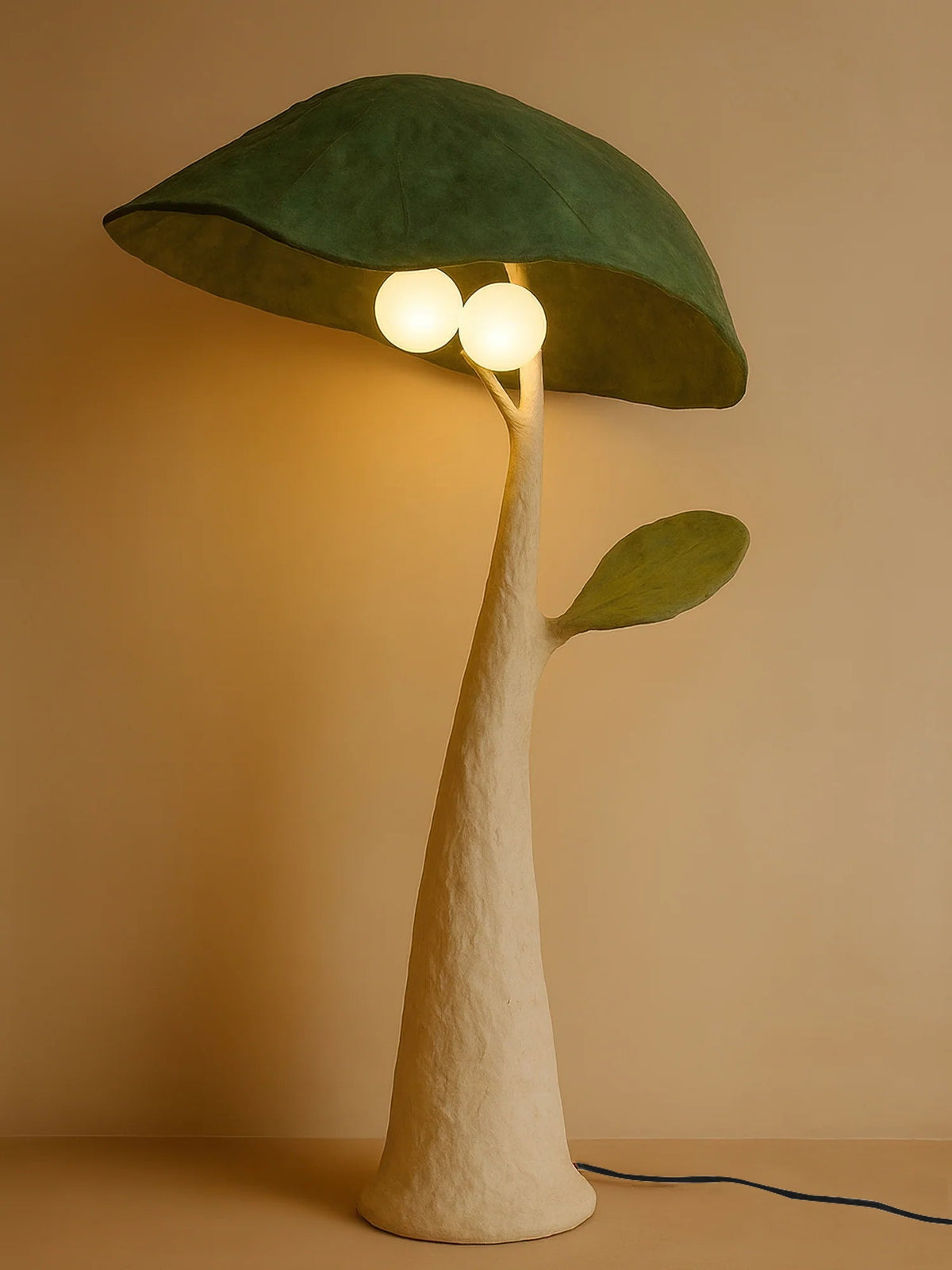 The Soloma Floor Lamp shown from a side angle, highlighting its curved stem.
