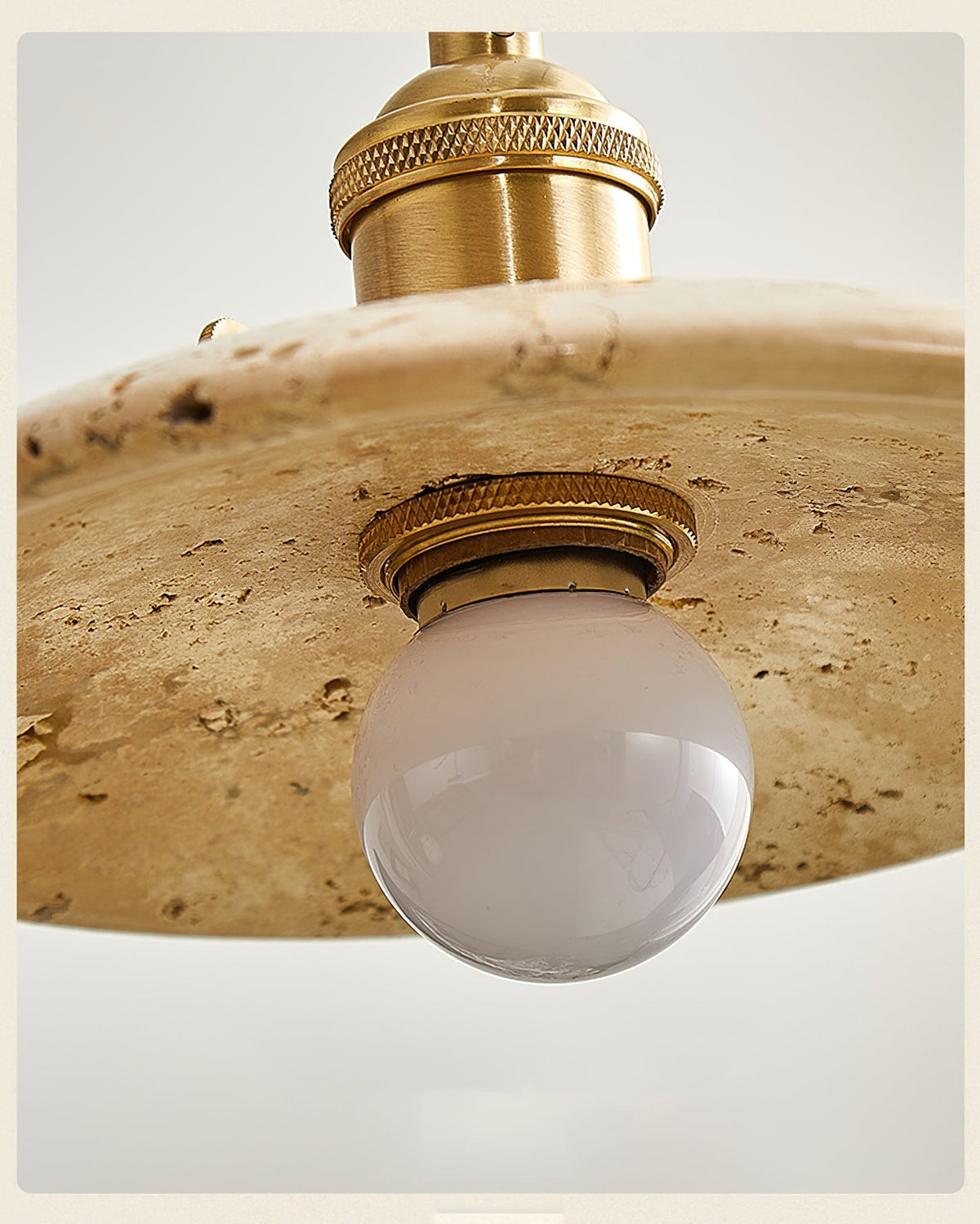 A pair of Stella Pendant Lights hanging at different heights for a dynamic look.