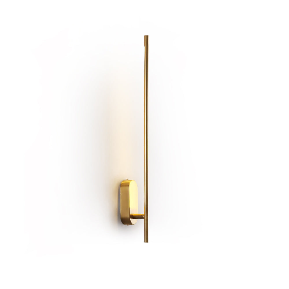 Front view of the brass stick-shaped metal sconce.