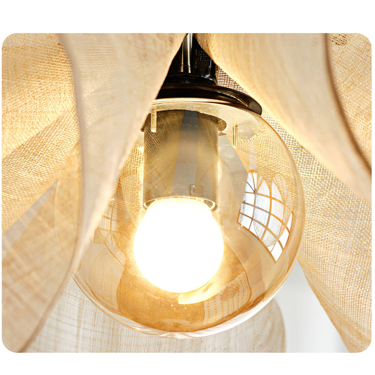 The light brown pendant lamp illuminated, casting a warm glow.