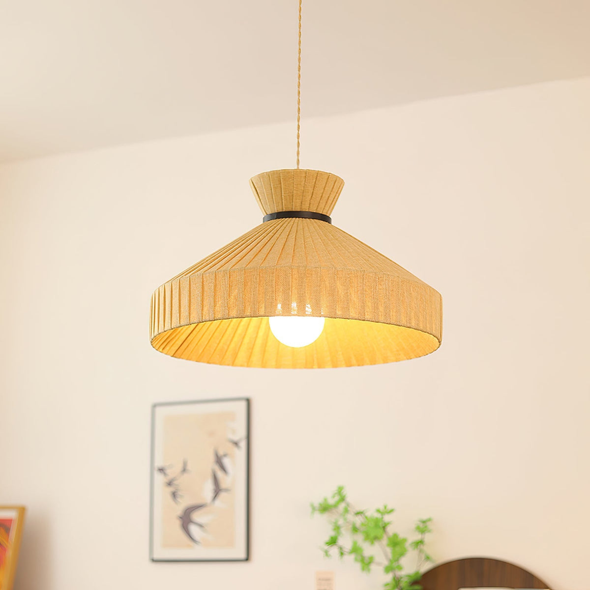 Angled shot of the Surora Pendant Light, showing its refined silhouette.