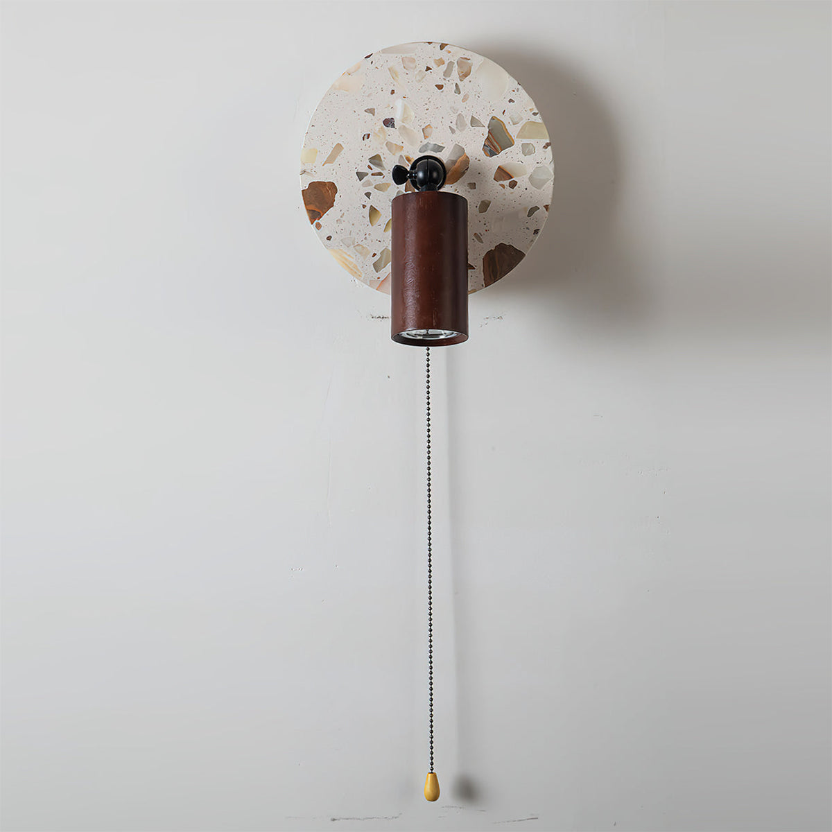 Swizzle Wall Lamp in a hallway setting, adding a warm glow.