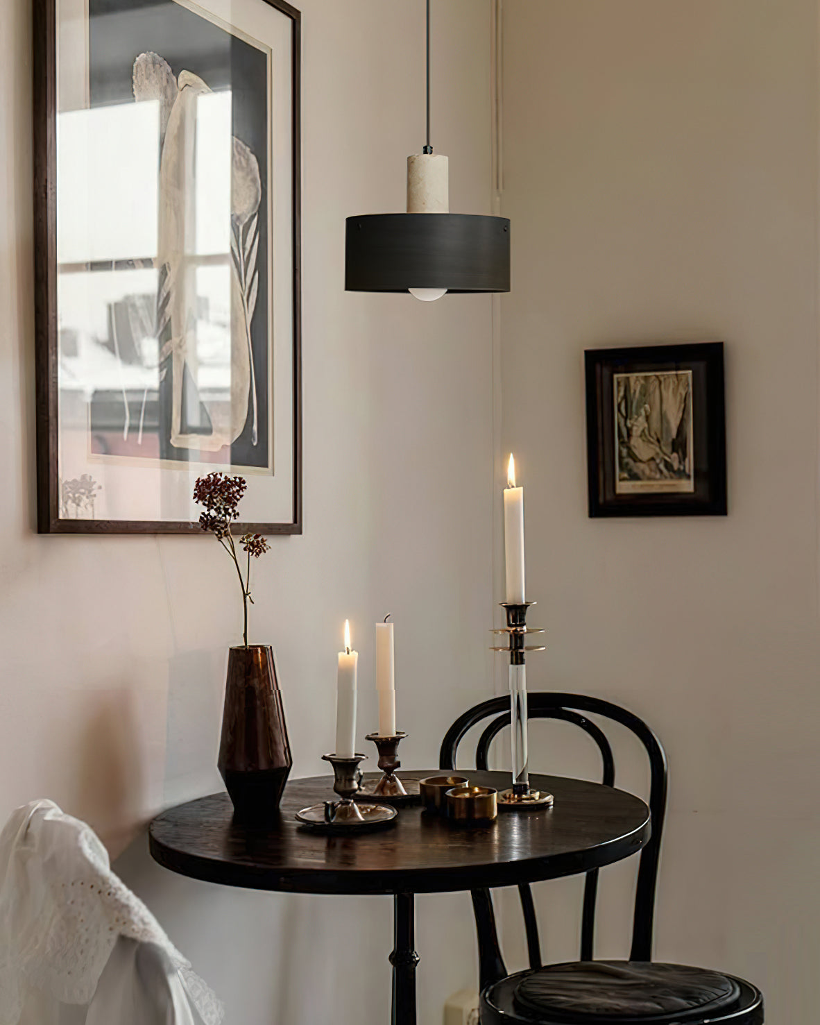 View of the ceiling mount and suspension wire for the Tako Pendant Lamp.
